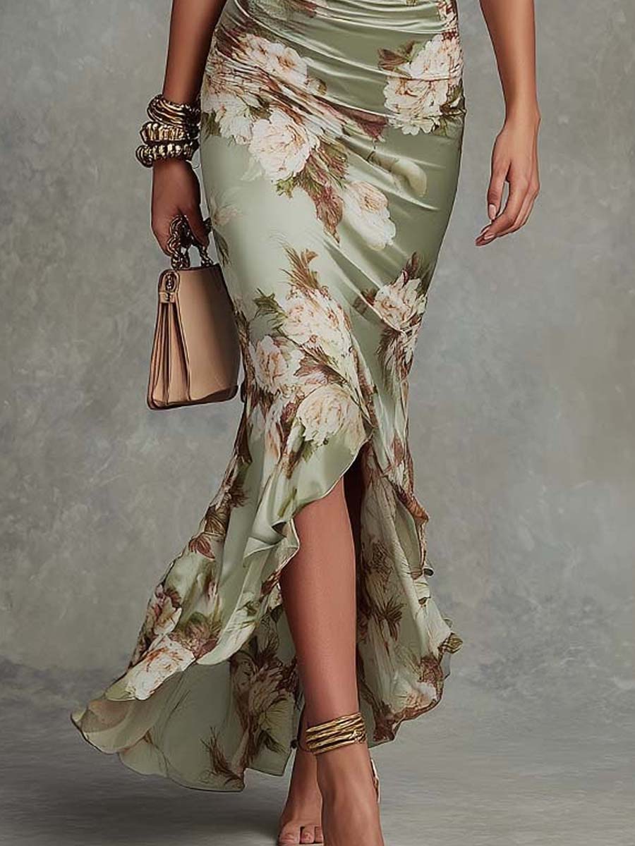 Isabelle | Robe longue asymétrique à encolure en V, manches bouffantes évasées et motif floral